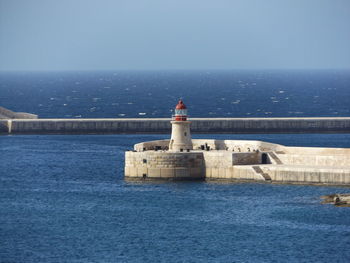 View on breakwaters of st. elmo and ricasoli, these are protecting the bay  nearby valletta, malta.