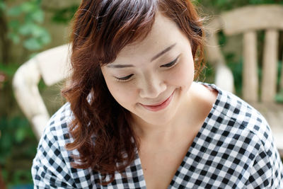 Portrait of smiling young woman