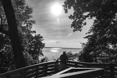 Scenic view of lake against cloudy sky