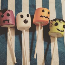 Close-up of faces made on marshmallows