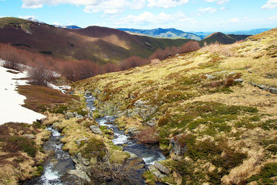 Panoramic view from the malghe on the slopes of corno alle scale in late spring.