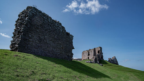 Old ruins of duffus castle  against sky