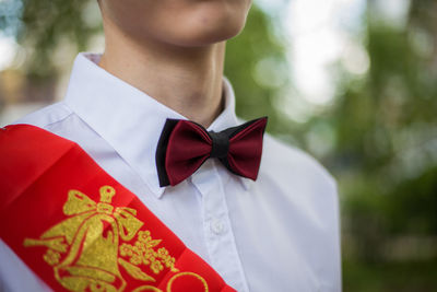 Close-up of man wearing uniform