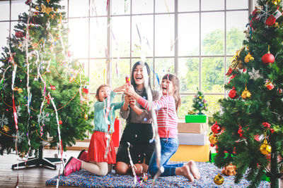 Group of people at christmas tree