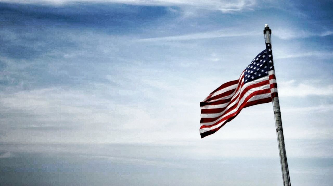 patriotism, national flag, flag, identity, american flag, low angle view, striped, sky, culture, pole, wind, pride, flag pole, star shape, red, waving, cloud, cloud - sky, fluttering, no people