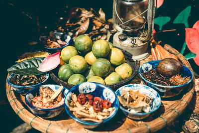 Fruits in plate on table