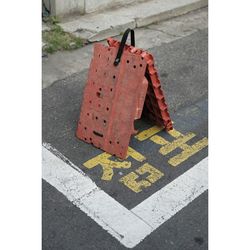 High angle view of red umbrella on street