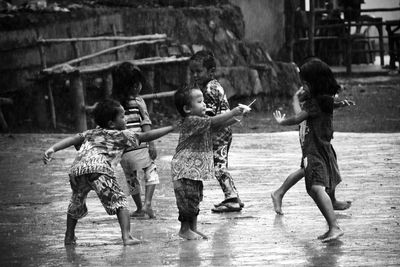 Boys playing in water