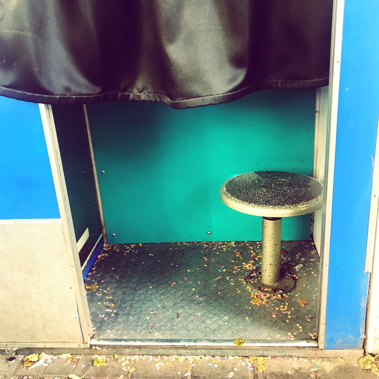 CLOSE-UP OF CHAIRS AGAINST WATER