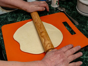 High angle view of person preparing food