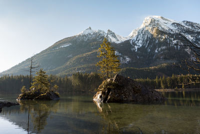 Scenic view of snowcapped mountains against clear sky