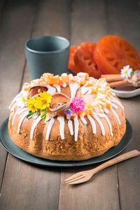 Bael fruit cake decorated with small flowers on top, sweet and healthy dessert,