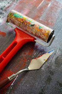 High angle view of paintbrushes on table