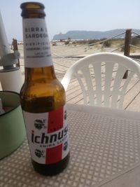 Close-up of beer bottle on table