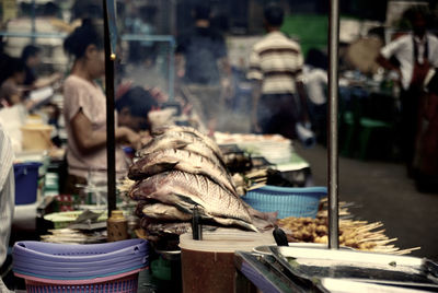 Woman selling seafood at market