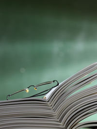 Close-up of eyeglasses on books