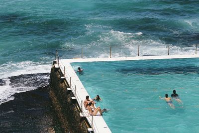 High angle view of people in swimming pool