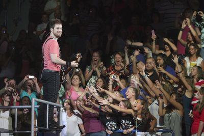 Group of people looking at music concert