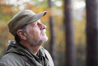 Side view of man looking away