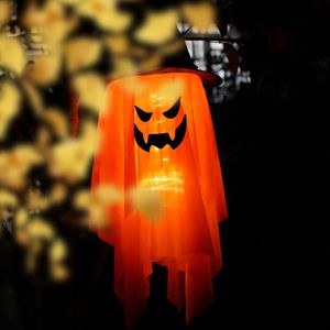 Close-up of jack o lantern against black background