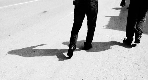 Low section of man standing on floor