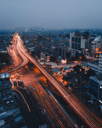 High angle view of illuminated city at night