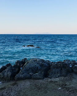 Scenic view of sea against clear sky