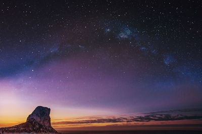 Scenic view of star field against sky at night