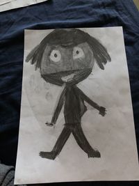 Low angle view of sculpture on paper