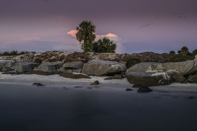 Scenic view of sea against sky at sunset