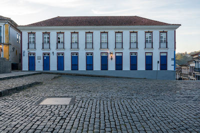 View of building against cloudy sky