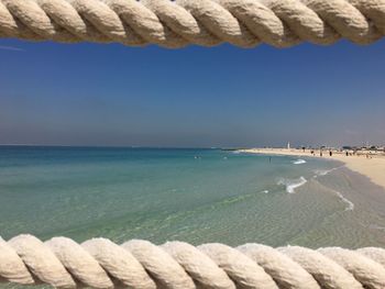 Scenic view of calm sea against blue sky