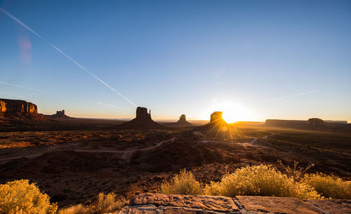Scenic view of landscape against sky during sunset