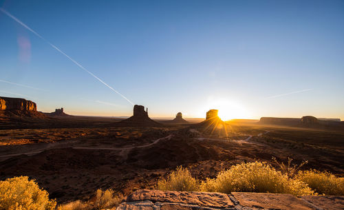 Monument valley  against sky during sunset