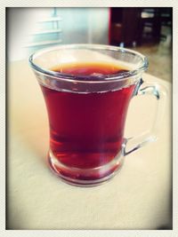 Close-up of tea in glass on table