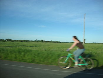 Man cycling on road