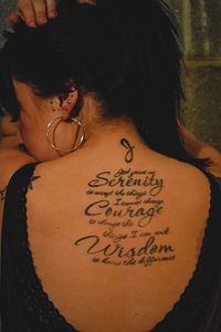 Rear view of woman with text