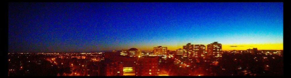 Illuminated cityscape at night