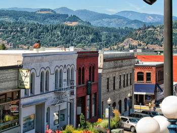 Buildings and mountains in city