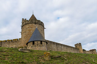 Low angle view of historic building against sky