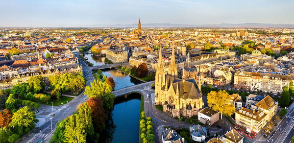 High angle view of river amidst buildings in city