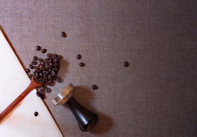 High angle view of coffee beans on table