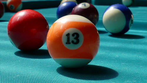 Close-up of multi colored balls on table