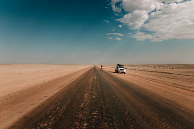 Car on desert road