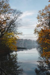 Scenic view of lake against sky during autumn