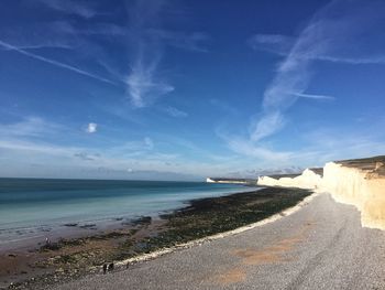 Scenic view of sea against blue sky