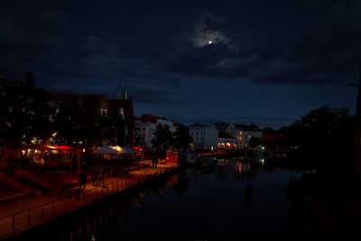 Residential district by river at night