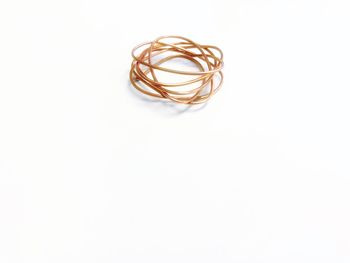 Directly above shot of heart shape over white background