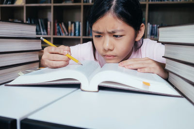 Girl studying at table