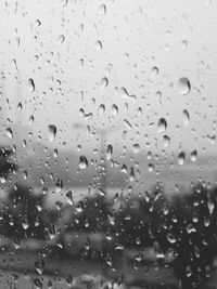 Close-up of water drops on glass